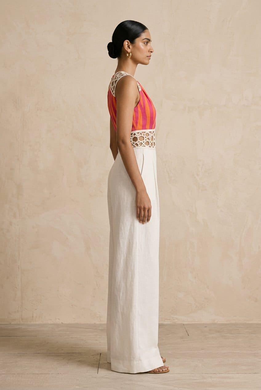 Striped Panel Lasercut Jumpsuit in Fuchsia & Orange Stripe, worn